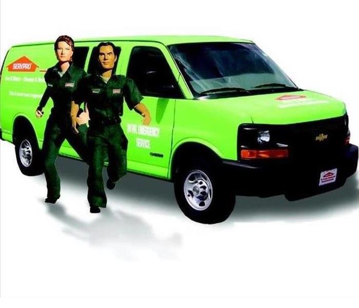 SERVPRO van in the background and two cartoon like men running to the customers rescue